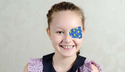 Girl wearing an eye patch
