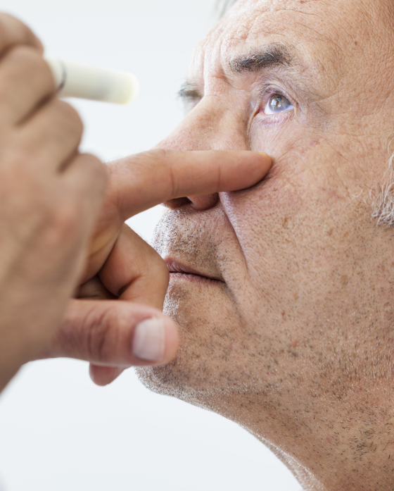 Older man receiving an eye exam